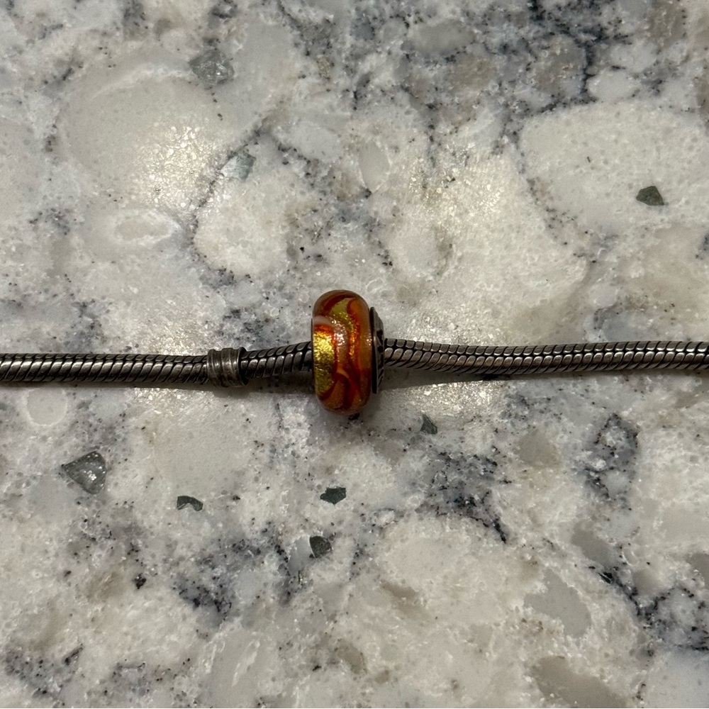 Orange glass Chamilia bead